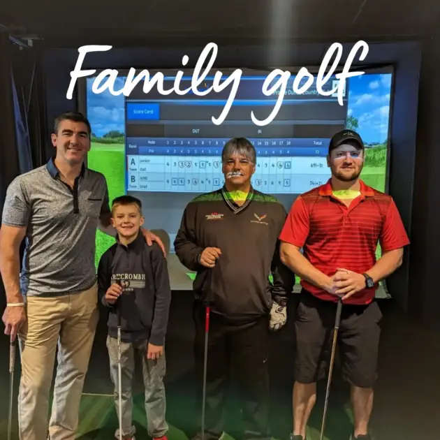 Family enjoying an interactive indoor golf lesson with Simon McGreal in Reading